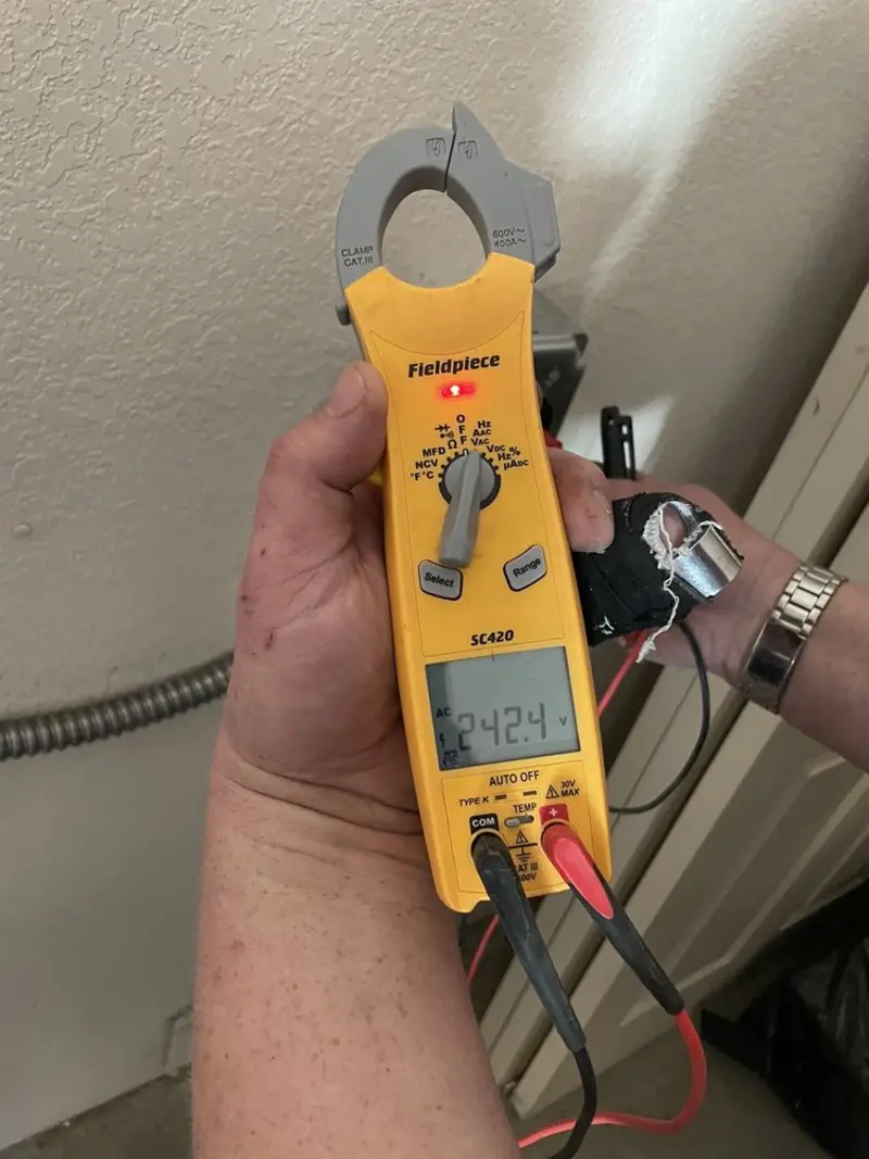 Voltage testing with clamp meter during Hot Tub / Pool Electrical Wiring in Charlotte